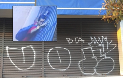 Jovem é filmado pichando porta de loja no centro de Ourinhos 